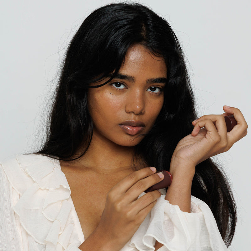 Gently glide stick over wrists